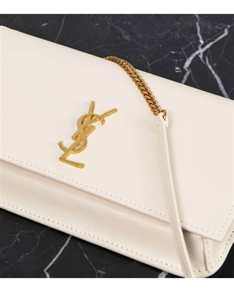 porta cellulare yves saint laurent|Cassandre leather phone pouch in white .